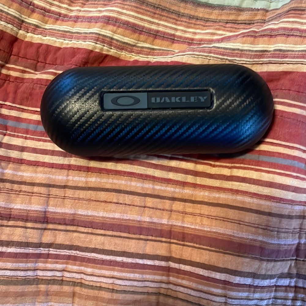 Oakley hard carbon sunglasses case.